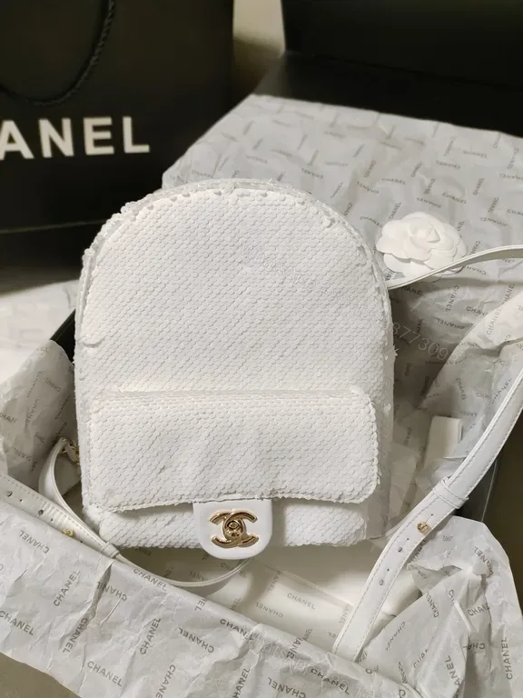 View 1 of Textured White Mini Backpack â€“ Luxe Chanel-Inspired, Quiet Luxury