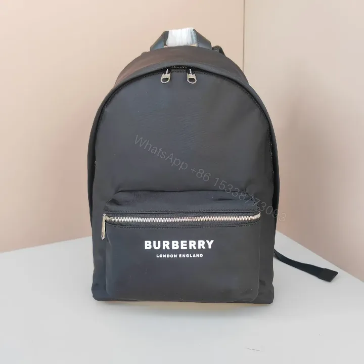 View 1 of Black Nylon Backpack with Front Pocket, Minimal Luxury, Everyday Carry