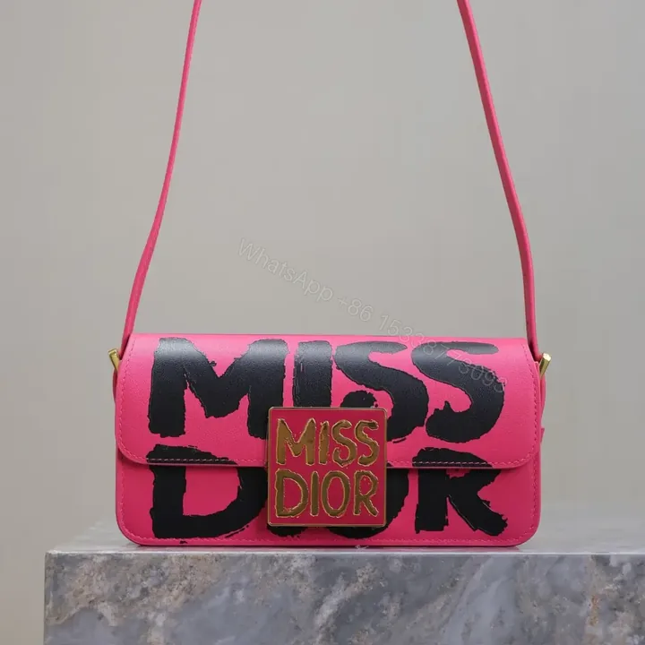 View 1 of 高仿Dior*Miss系列M261M929小牛皮塗鴉字面腋下包粉色免檢版