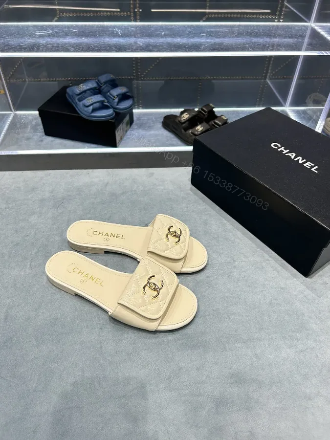 View 1 of Beige Quilted Strap Slide Sandals with Gold Double-C Logo