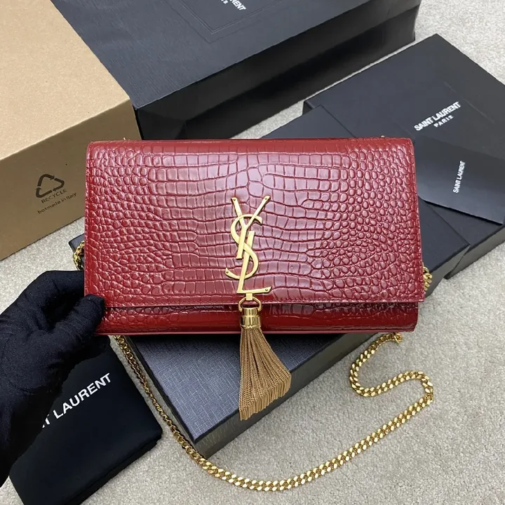 View 1 of Structured Red Leather Clutch with Gold Hardware and Tassel