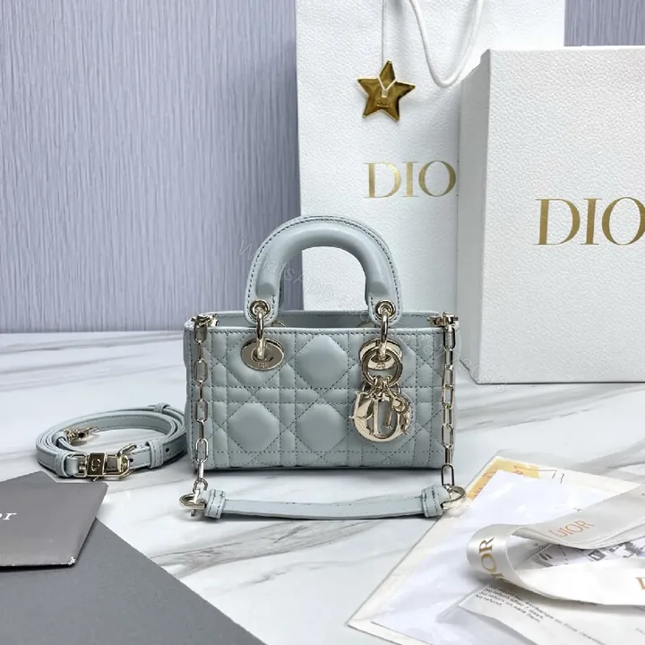 View 1 of Soft-Texture Quilted Mini Bag with Gold Charms, Calfskin, Elegant Chic, Luxury Carryall
