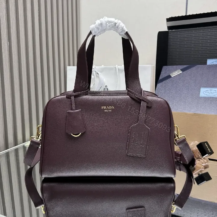 View 1 of Structured Burgundy Pebble-Leather City Bag with Gold Hardware