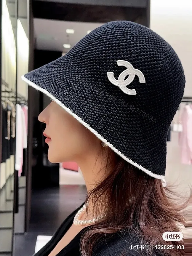 View 1 of Navy Knit Bucket Hat: Luxe Logo, Embossed Detailing