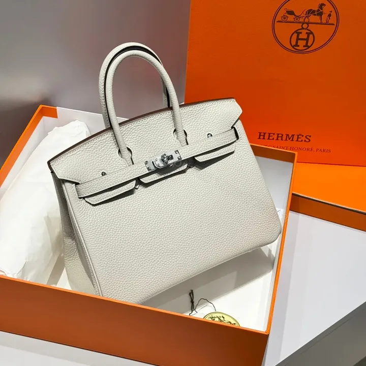 View 1 of HN 25CM BEIGE TOGO LEATHER GOLD HARDWARE