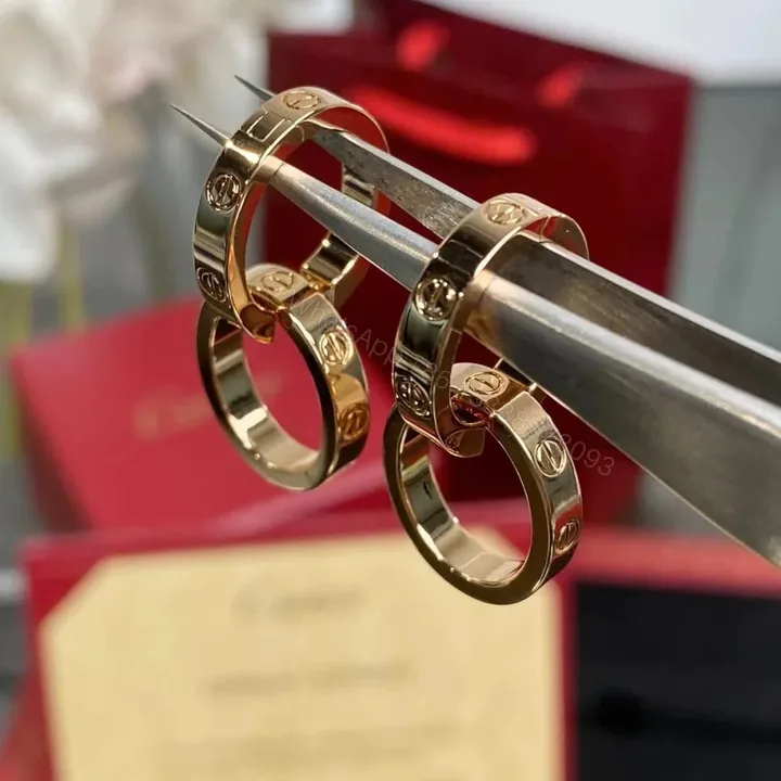 View 1 of 18K Gold Cartier Double Hoop Transformable Love Earrings