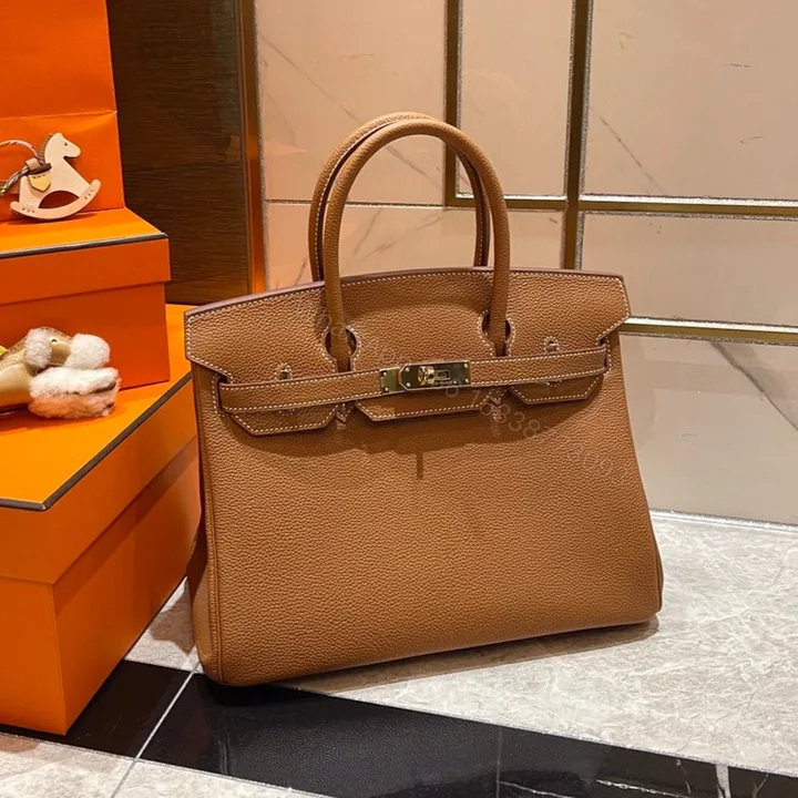 View 1 of HERMES BIRKIN 30CM GOLD TOGO LEATHER GOLD HARDWARE