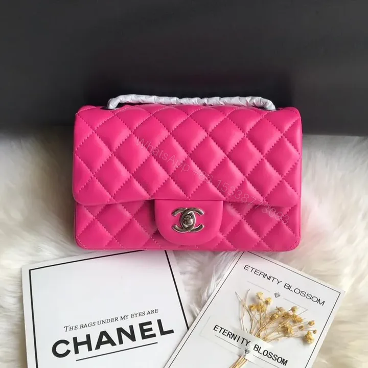 View 1 of CHANEL 20 CLASSIC SMALL DOUBLE FLAP BAG IN DEEP PINK CALFSKIN
