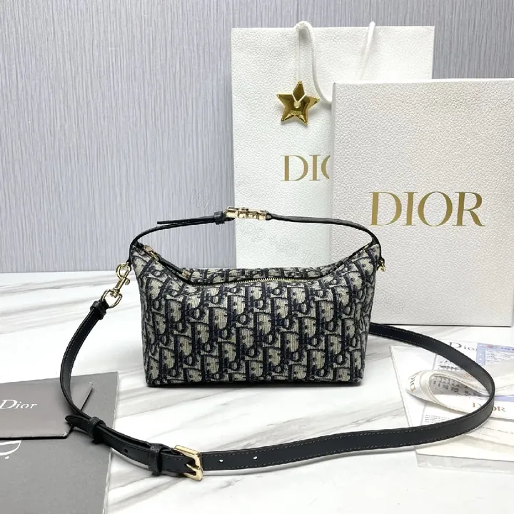 View 1 of Compact Luxury Pouch: Dior-Patterned Mini Bag with Gold Hardware