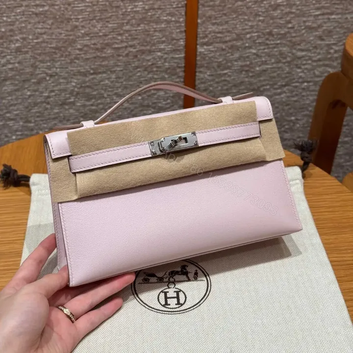 View 1 of HN POCHETTE 22 IN LIGHT PINK SILVER HARDWARE