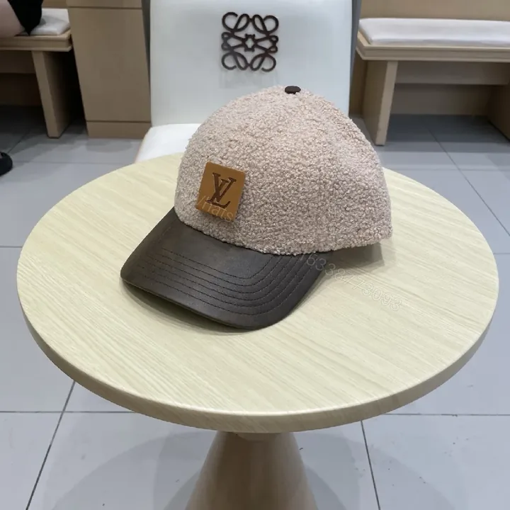 View 1 of Textured Luxe Boucle Cap with Subtle LV Patch Cap