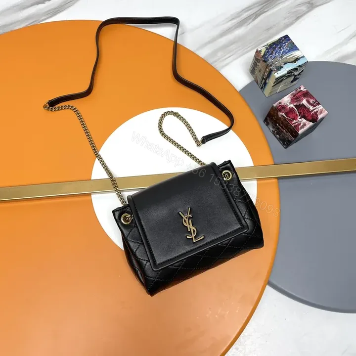View 1 of Chic Quilted Black Crossbody with Gold YSL Logo