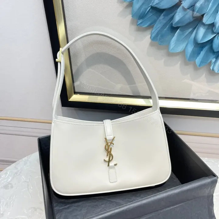 View 1 of Minimalist White Leather Handbag with Gold YSL Accent
