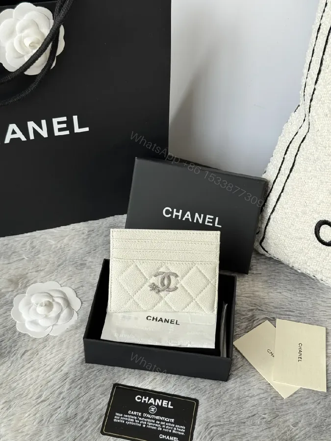 View 1 of Quilted Lambskin Wallet | Silver Logo, Compact & chic