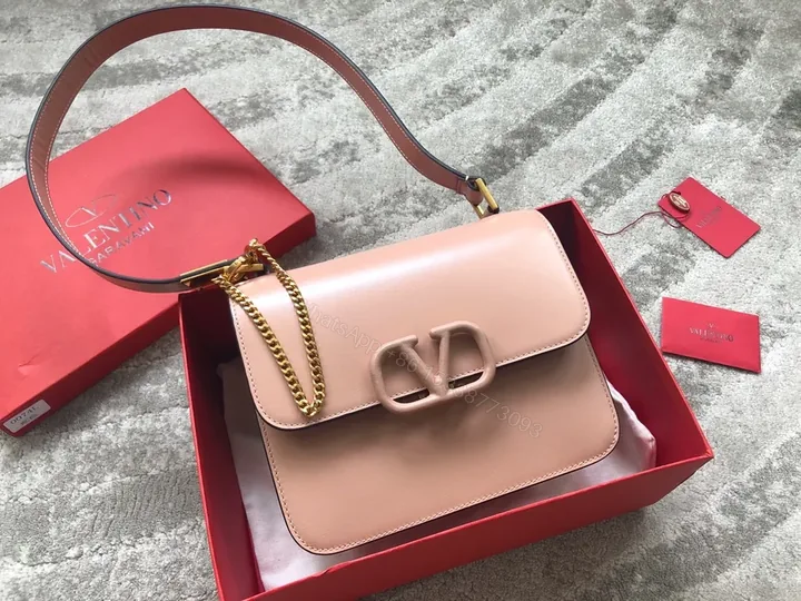 View 1 of Two-Tone Calfskin Crossbody with V Buckle Bag