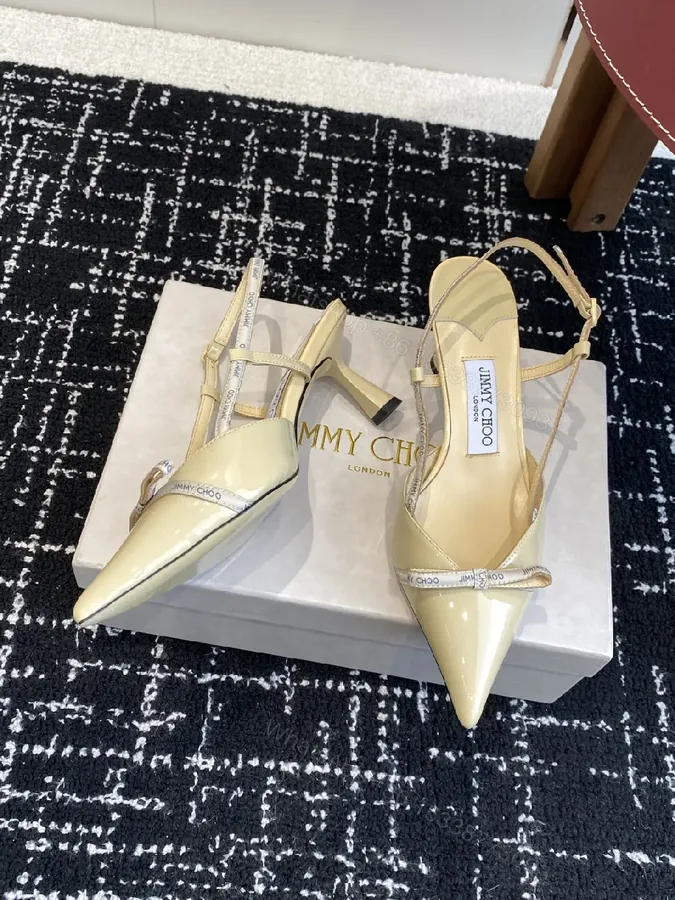 View 1 of Strappy Pointed-Toe Heels with Logo Straps - Everyday Glam