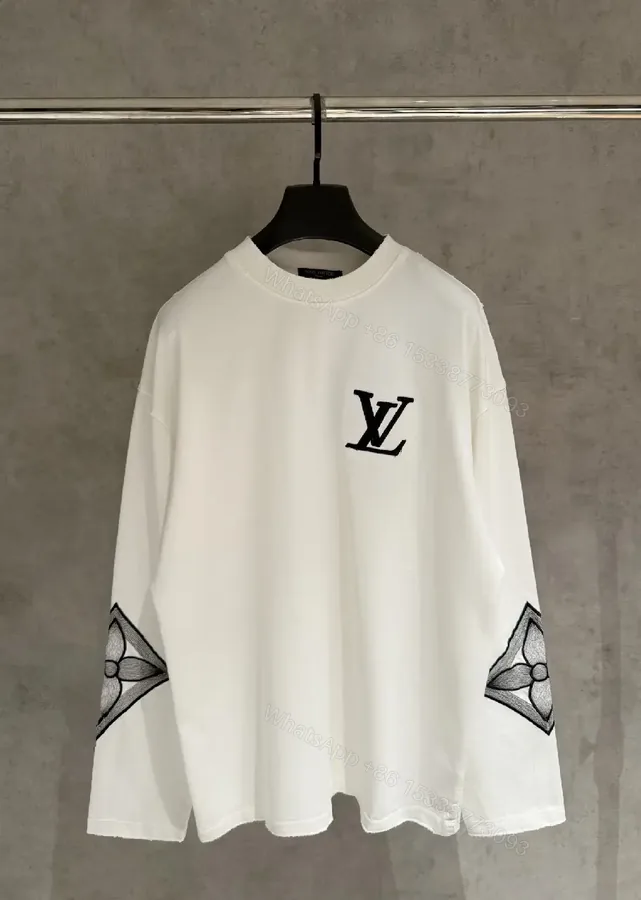 View 1 of White Cotton-Blend Pullover with LV Logo & Architectural Sleeves