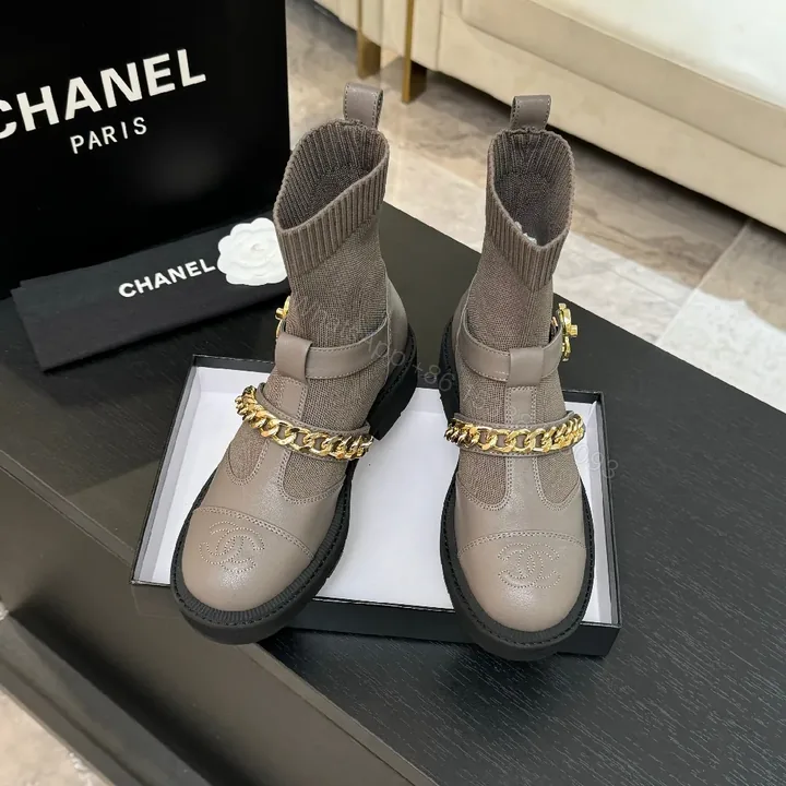 View 1 of Taupe Knit Sock-Ankle Boots with Leather Accents and Gold Chain