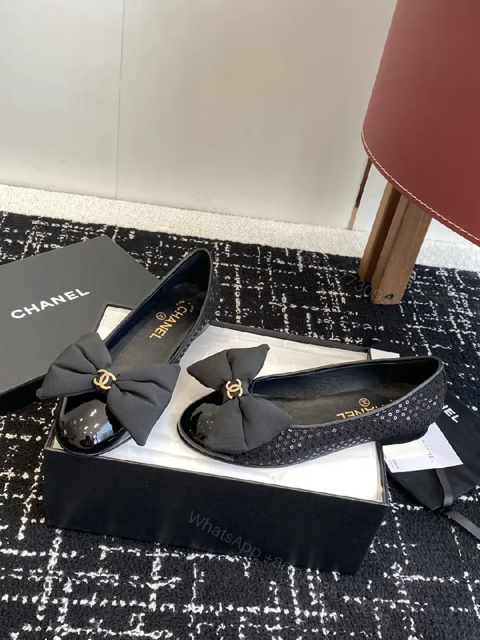 View 1 of Chic Black Patent Ballet Flats with Ribbon Bow Accent