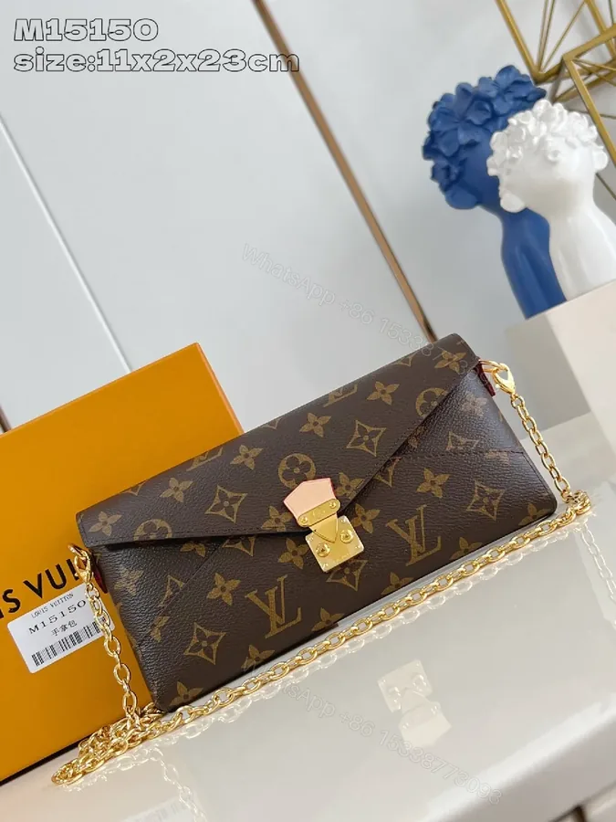 View 1 of Chic Monogram Canvas Bag with Gold Lock and Chain