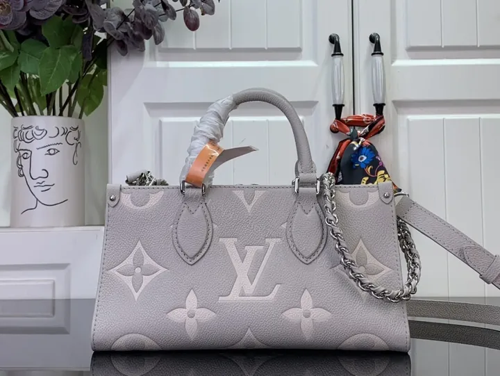 View 1 of Monogram Texture Leather Messenger Bag: Timeless Luxe, All-Day Comfort