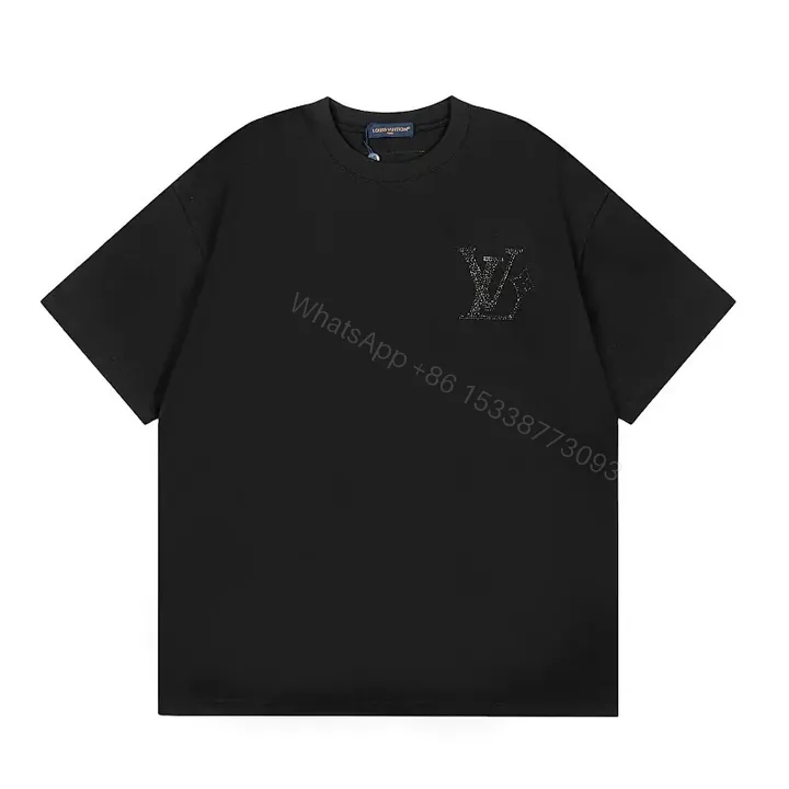 View 1 of Minimalist Black Cotton Tee with Subtle Monogram Detail - Everyday Luxury