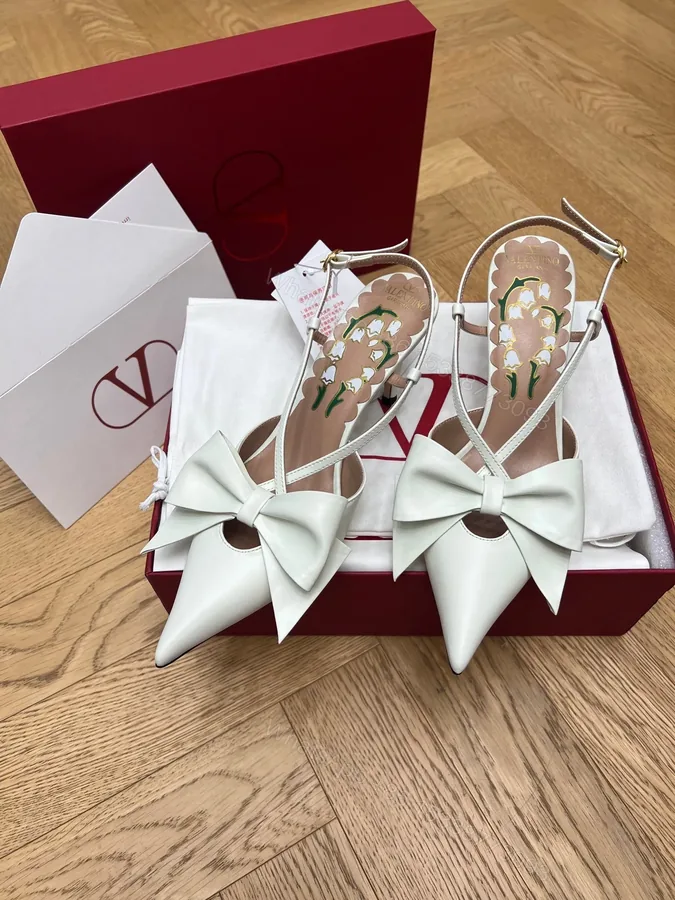 View 1 of Valentino Women White Leather Bow Accent Pumps