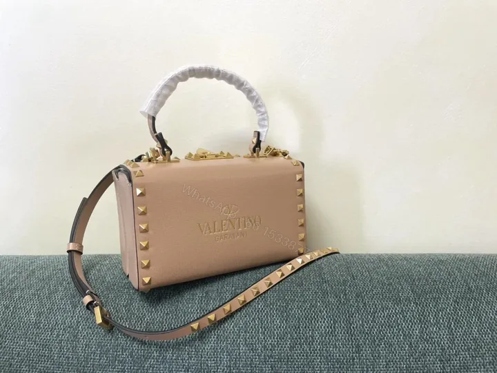 View 1 of Chic Pink Rockstud Mini Bag: Compact Luxury Handbag