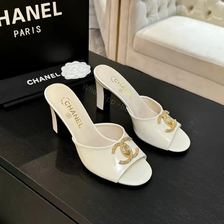 View 1 of Patent Leather Mules – Ivory, Open-Toe, Gold Emblem, All-Day Comfort