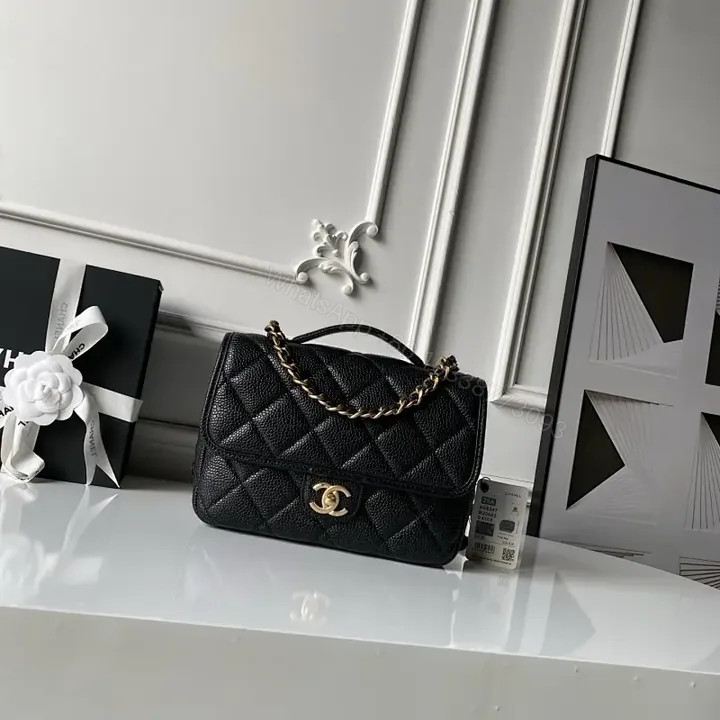 View 1 of Quilted Black Bag with Gold Chain—Timeless Luxury Utility