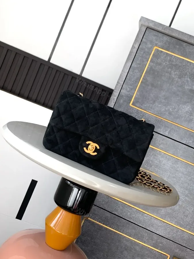 View 1 of Quilted Black Shoulder Bag with Gold Hardware - Chic Luxury Style