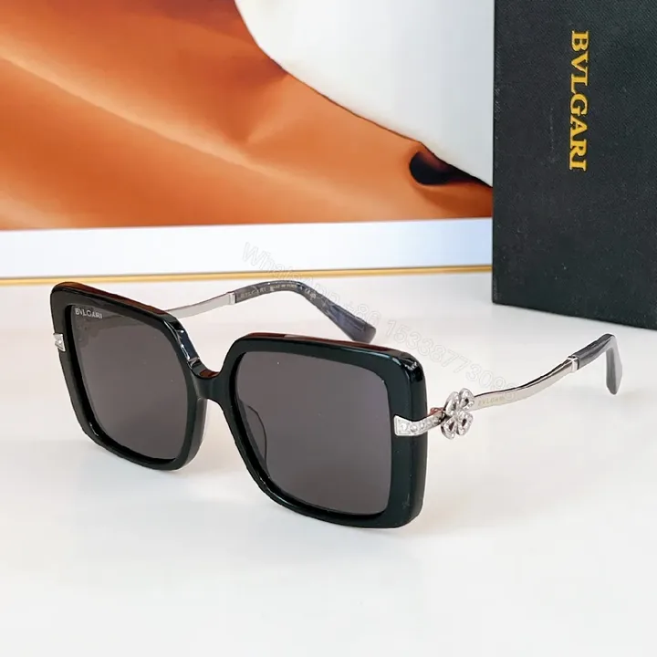 View 1 of Bold Black Enamel Oversized Sunglasses: Crystal Accents, Polarized Lens
