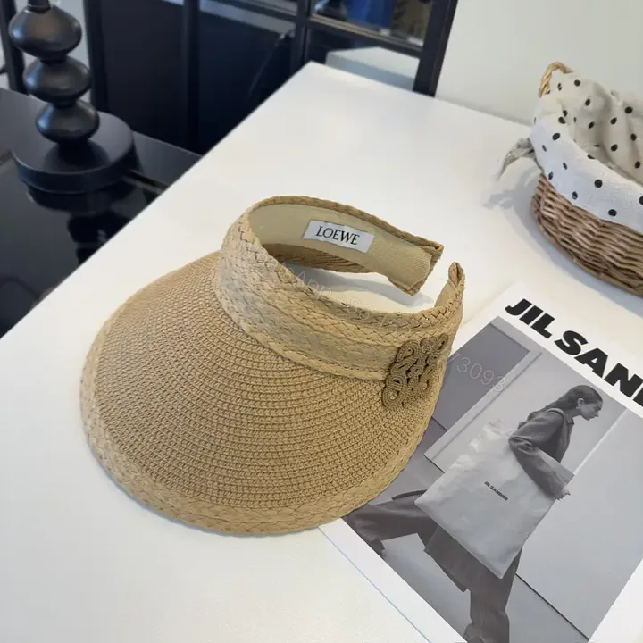 View 1 of Woven Straw Visor: Structured, Loewe-Inspired, Elegant Sun Hat