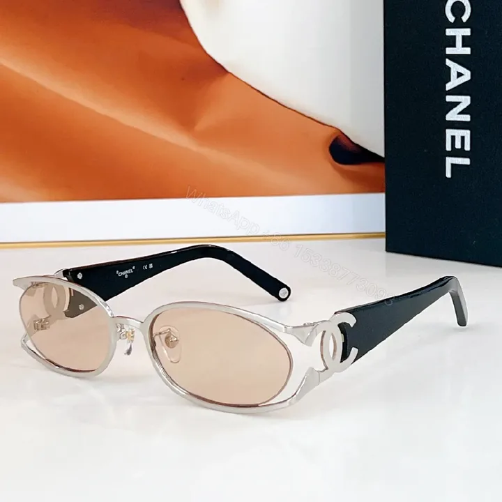 View 1 of Oval Sunglasses – Rose-Tinted, Semi-Rimless, Logo Detail