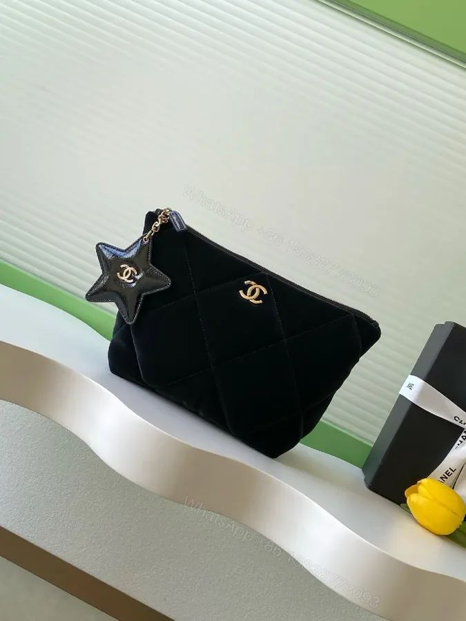 View 1 of Quilted Velvet Black Handbag with Gold Accent