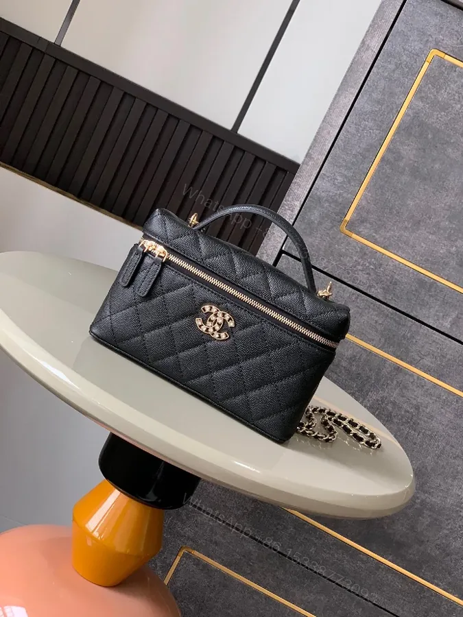 View 1 of Compact Quilted Bag with Gold Hardware - Classic Everyday Style