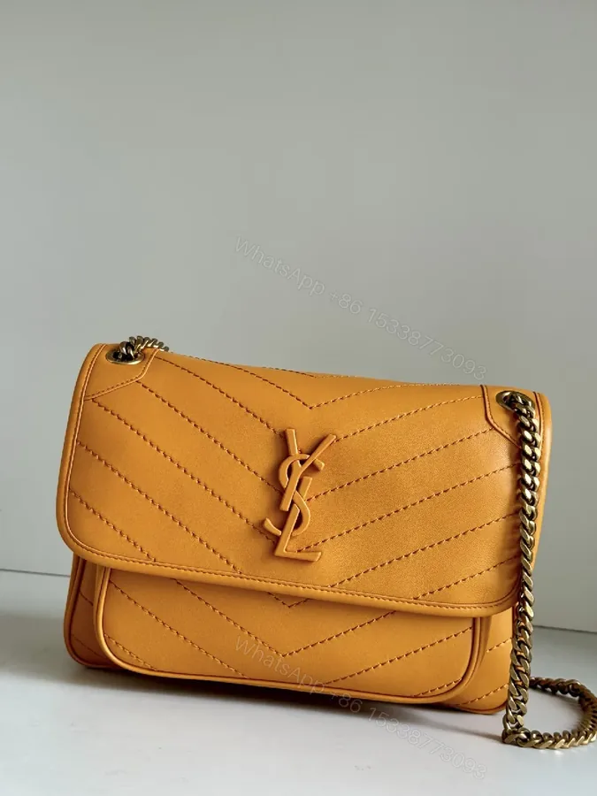 View 1 of Mustard Quilted Leather Crossbody with Chain Strap