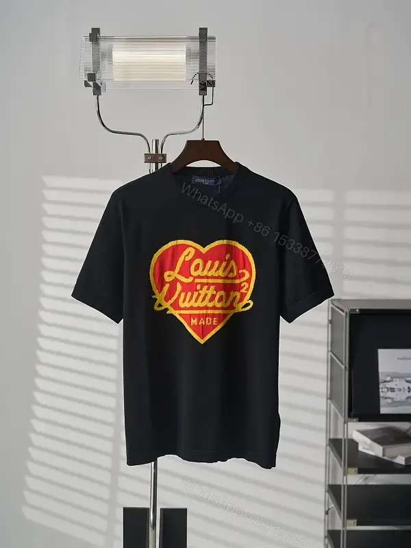 View 1 of Black Embroidered Heart Crewneck T-Shirt Louis Vuitton Logo Outline Feature