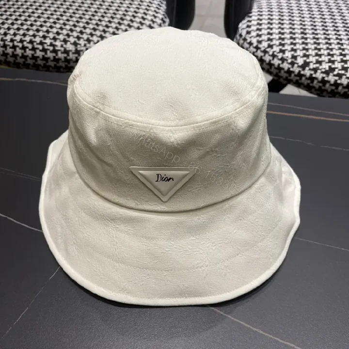 View 1 of Compact Luxury Bucket Hat with TriangleEmblem, Off-White, Textured Weave