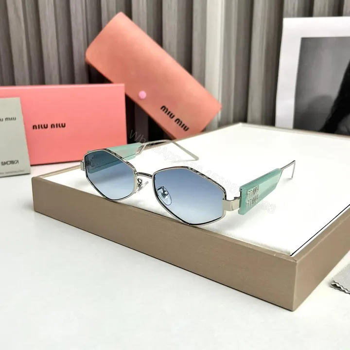 View 1 of Miu Miu Hexagon Light Green-Blue Sunglasses