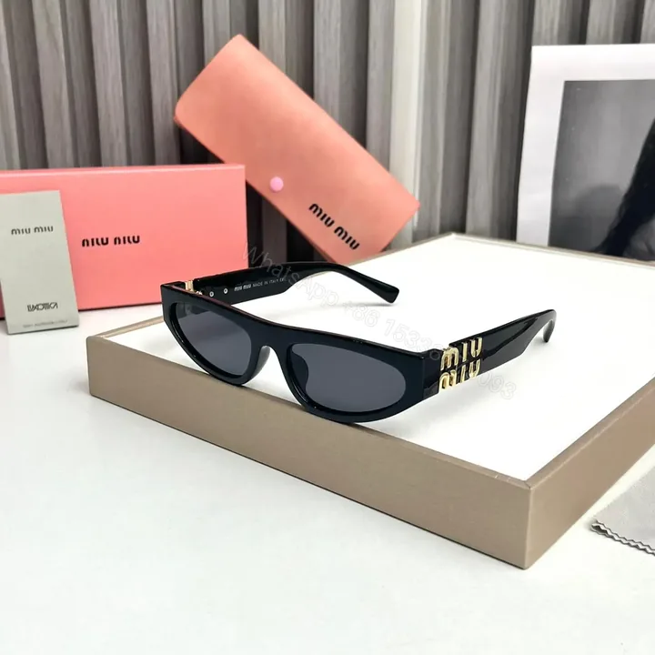 View 1 of Miu Miu Cat Eye Black Sunglasses Women UV Protection