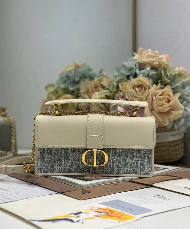 View 1 of Two-Tone Denim-Canvas Satchel with Gold Chain Bag