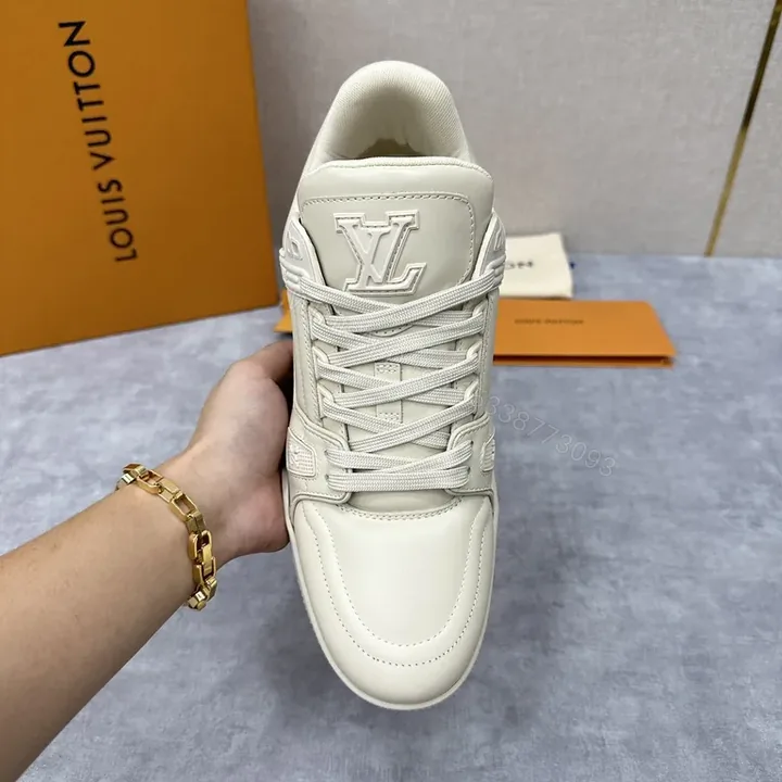 View 1 of Ivory Louis Vuitton-Style High-Top Sneakers: Luxe Everyday Comfort