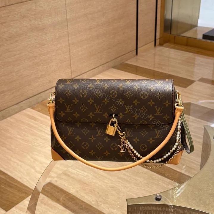 View 1 of Louis Vuitton Hide Away MM bag in Monogram canvas