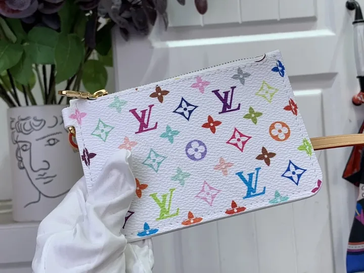 View 1 of Colorful Signature Clutch: Multicolor LV Monogram Pattern Leather Clutch