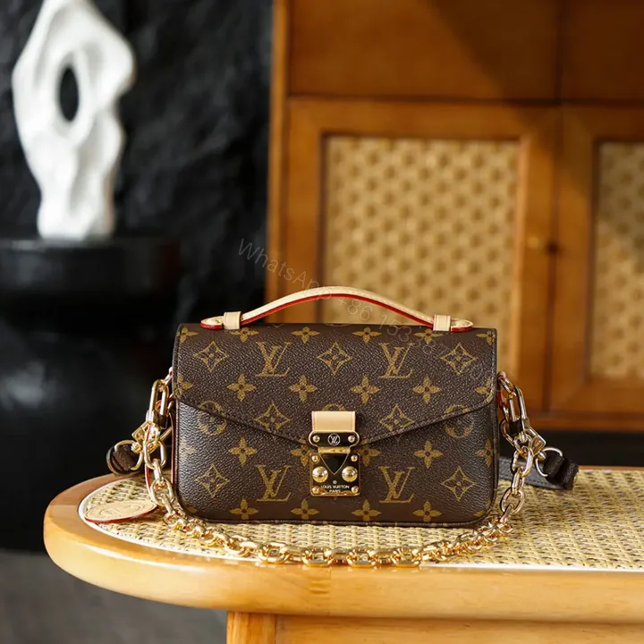 View 1 of Louis Vuitton Pochette Métis East West bag