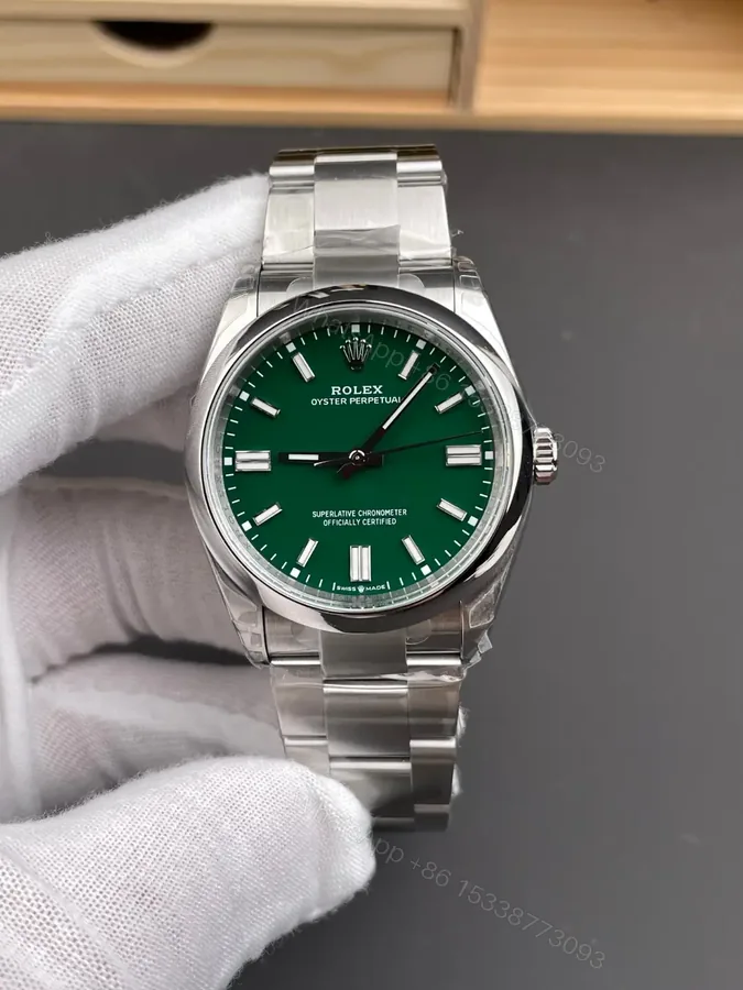 View 1 of Rolex Oyster Perpetual 36 126000 Green Dial Watch 126000-0005
