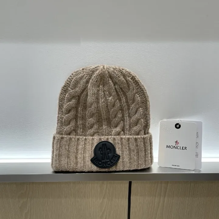 View 1 of Beige Cable Knit Beanie with Signature Patch Essential Warmth
