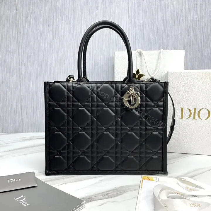 View 1 of Structured Black Quilted Handbag with Dior Charm