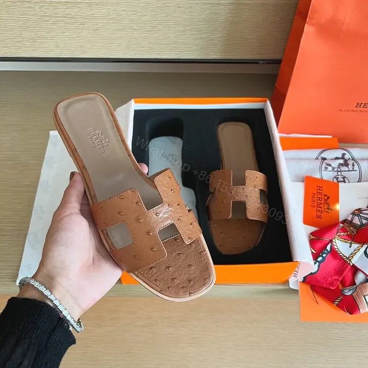 View 1 of Ostrich-Embossed Hermes-Style Sandals: Refined Comfort